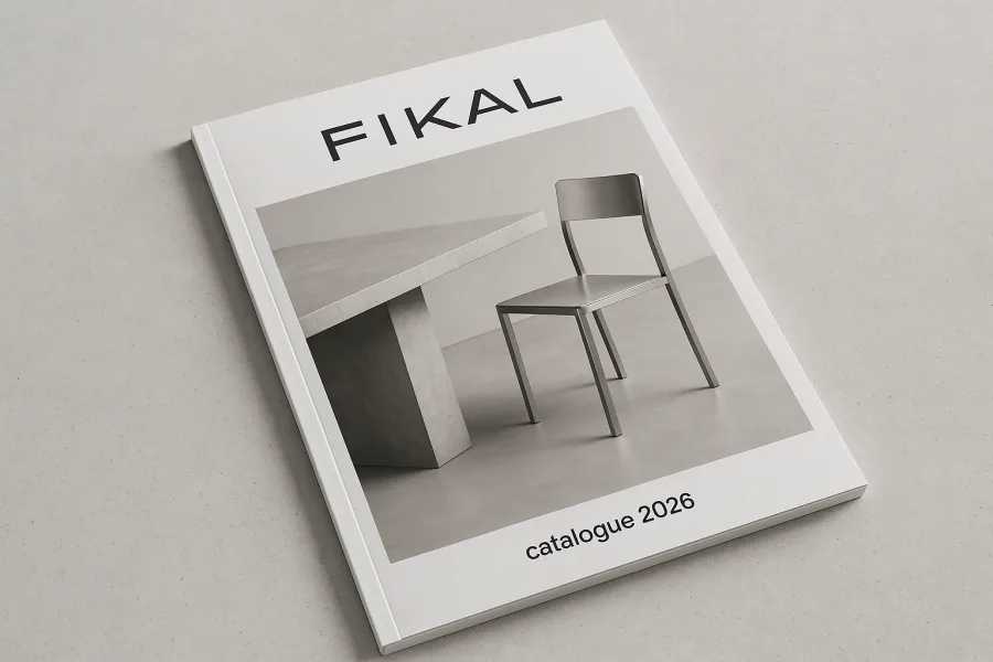 A4 furniture catalogue with a perfect-bound flat spine lying on a grey surface